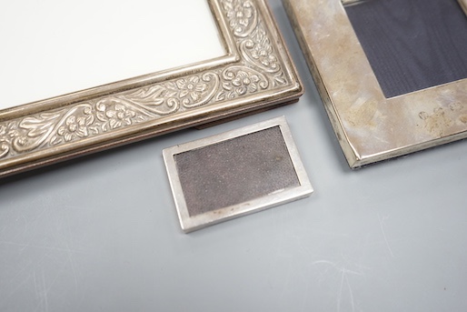 Three modern silver mounted photograph frames, largest 17.9cm.